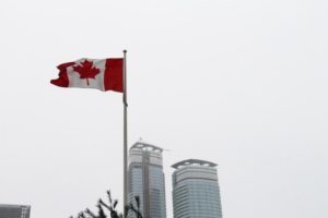 canadian-flag-pole-overcast-sky
